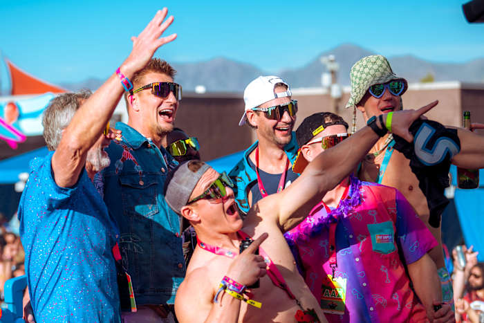 Tampa Bay Buccaneers legend Rob Gronkowski (second from left) is once again hosting his 'Gronk Beach' party in Las Vegas ahead of Super Bowl LVIII.